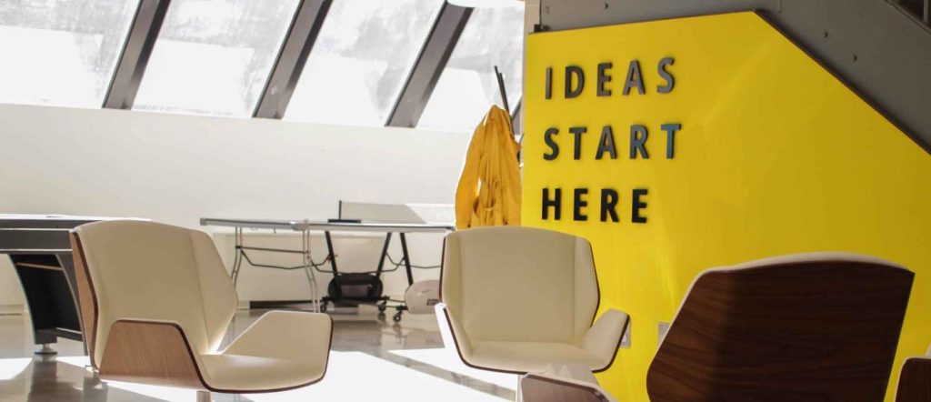 Image of an office with a yellow wall